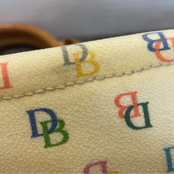Dooney & Bourke Cream Satchel Bag pre-owned. Strap has stain. - Picture 15 of 16